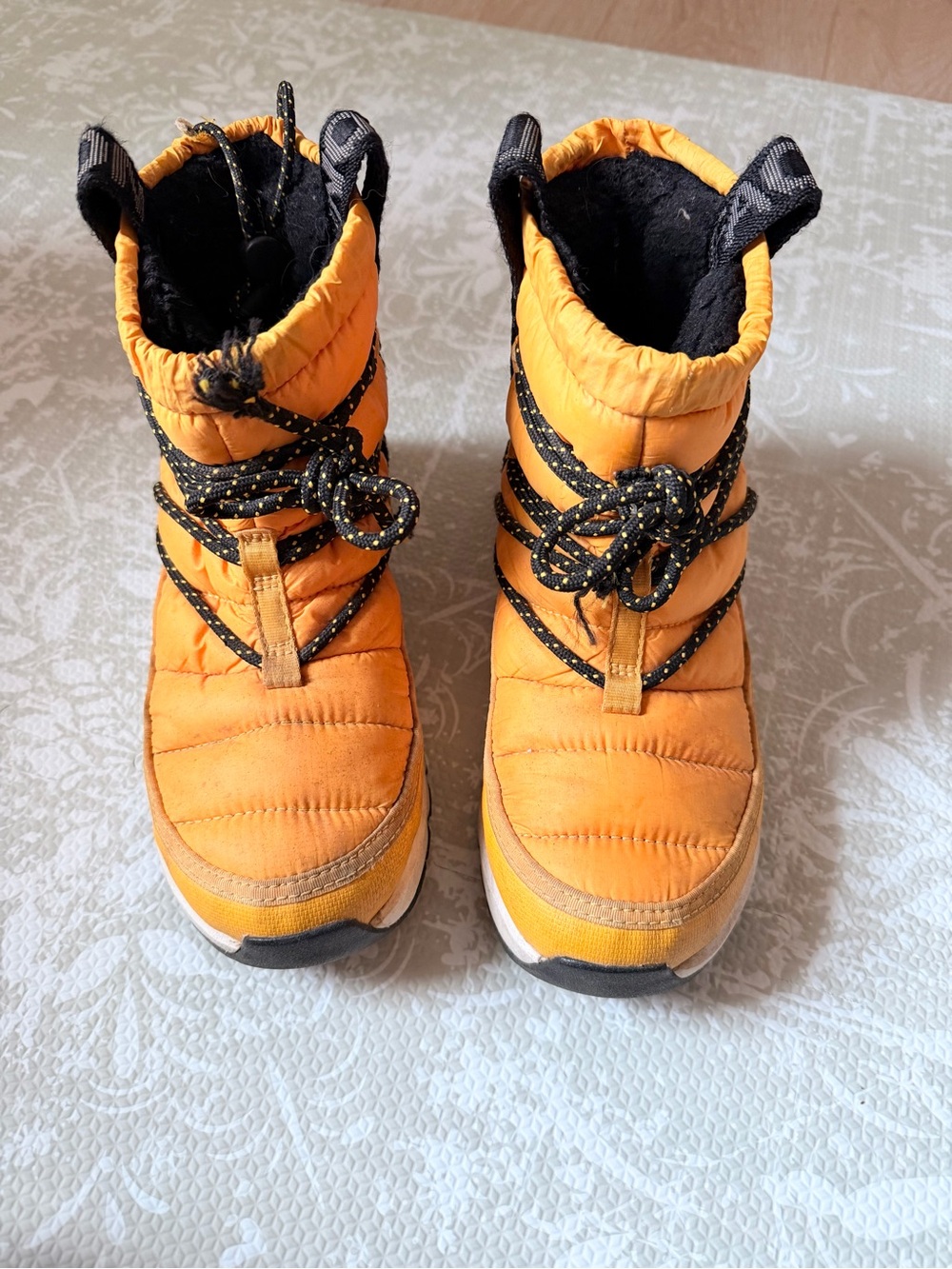 The North Face Thermoball lace up yellow winter boots, Women Size 6